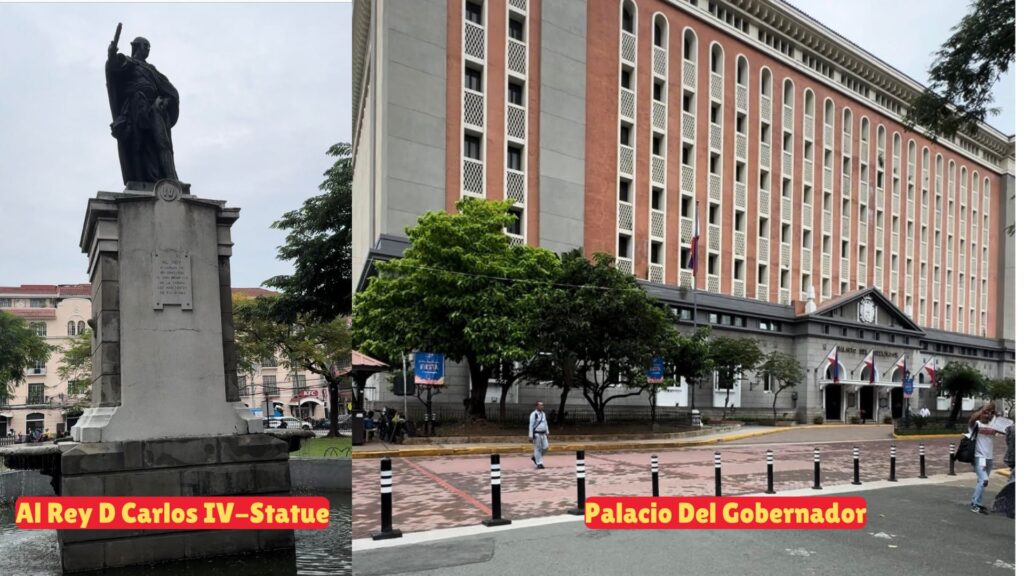 A man stands near the Al Rey D Carlos IV statue, with the Palacio del Gobernador visible behind him.